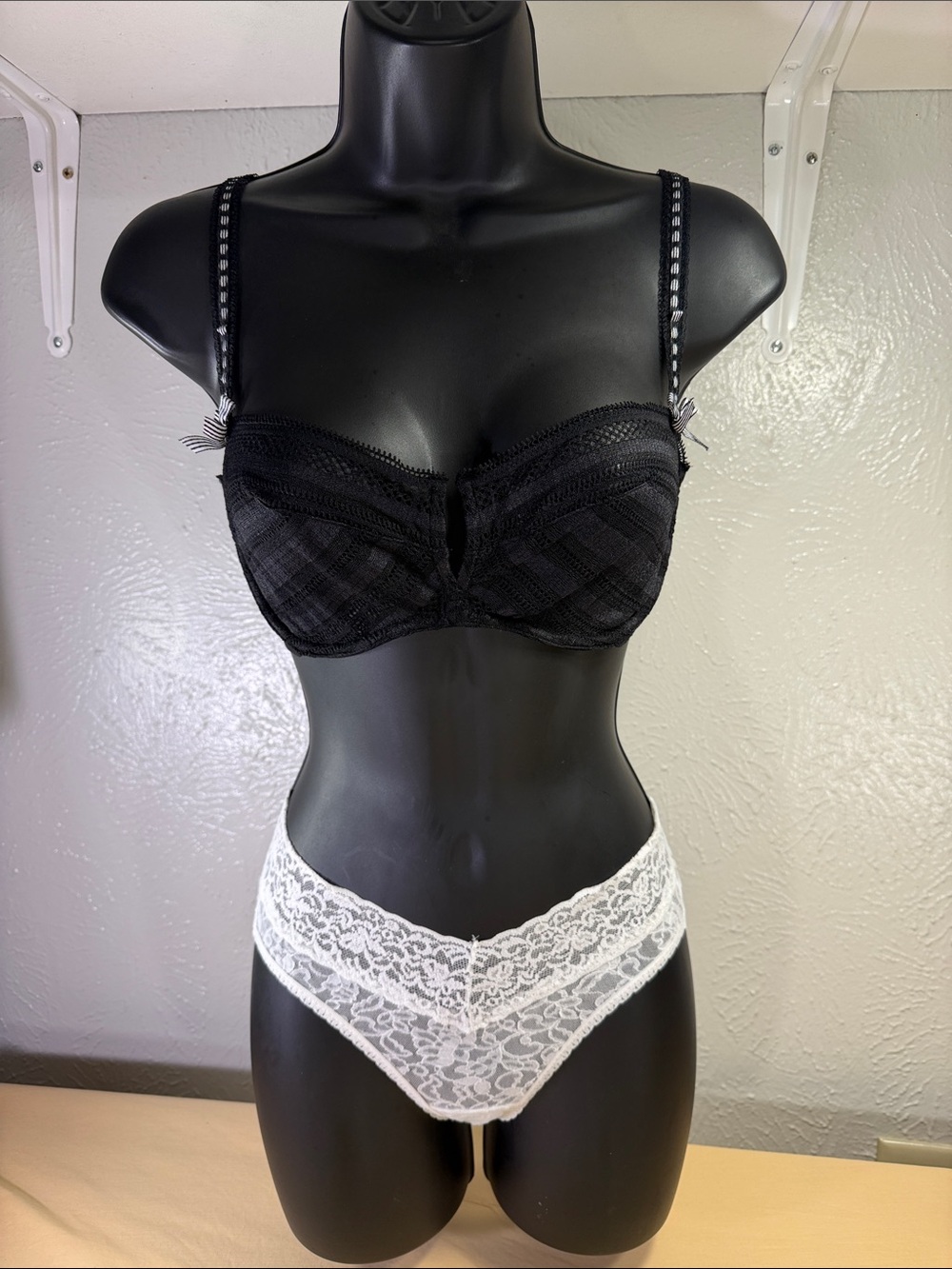 Victoria’s Secret black Balconette bra and white lace panties